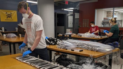 Workers at MakerSpace in New York City make face shields to assist with relief efforts during the coronavirus pandemic.