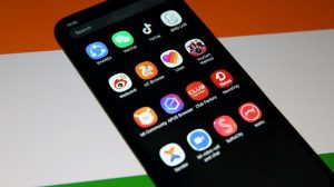 FILE PHOTO: Smartphone with Chinese applications is seen in front of a displayed Indian flag in this illustration picture taken July 2, 2020. REUTERS/Dado Ruvic/Illustration