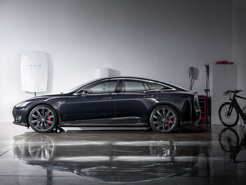 A Tesla car and Tesla Powerwall battery. (TESLA)