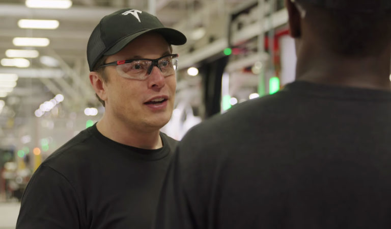 Elon Musk giving YouTube tech reviewer Marques Brownlee a tour of the Fremont factory. (Credit: MKBHD/YouTube)
