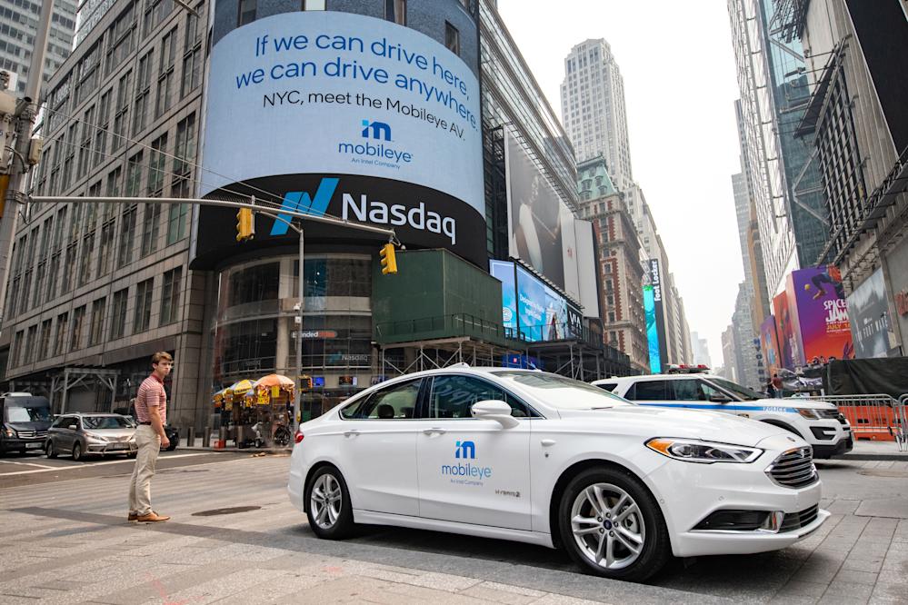 Mobileye’s CEO Amnon Shashua poses with a Mobileye driverless vehicle at the Nasdaq Market site in New York, July 20, 2021.
