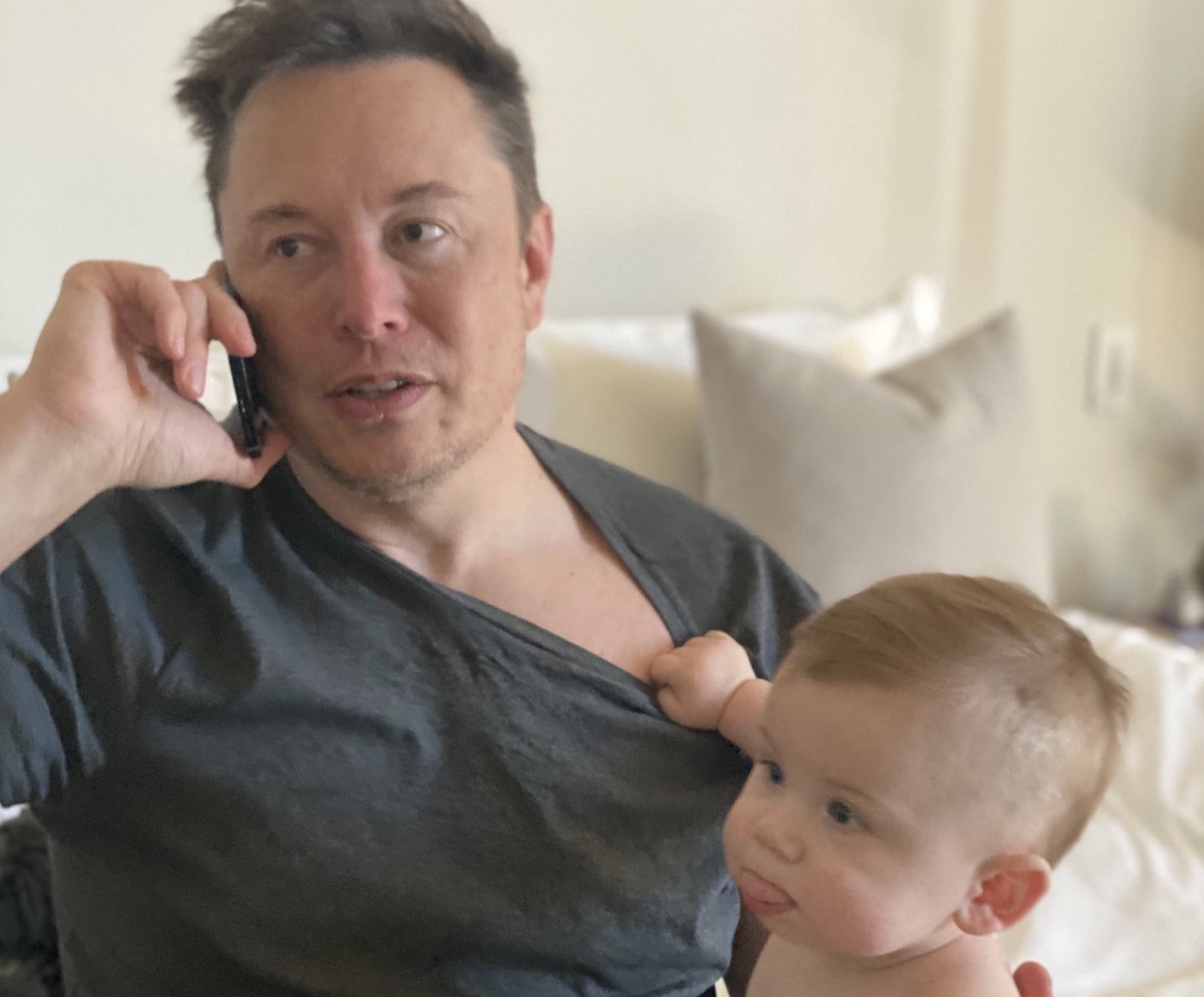 Above: Elon Musk and his son "Lil X" (Twitter: Elon Musk)