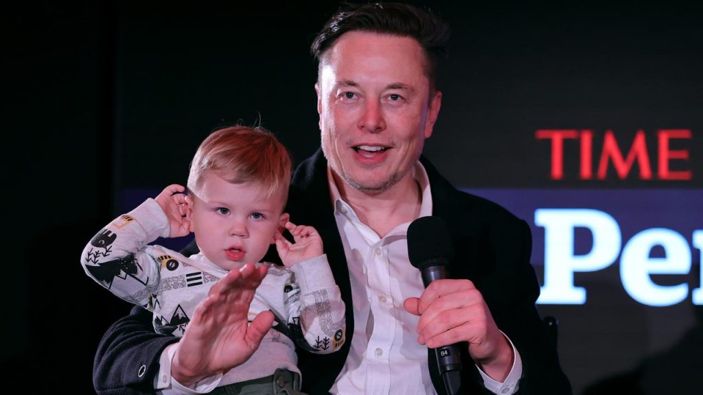 Elon Musk and one of his seven children. (Photo by Theo WargoGetty Images for TIME)