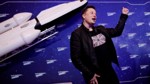 SpaceX owner and Tesla CEO Elon Musk gestures after arriving on the red carpet for the Axel Springer award, in Berlin, Germany, December 1, 2020. REUTERS/Hannibal Hanschke/Pool TPX IMAGES OF THE DAY - RC2IEK9DY5KB